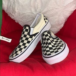 NWOT black and cream checkered vans. White sole.